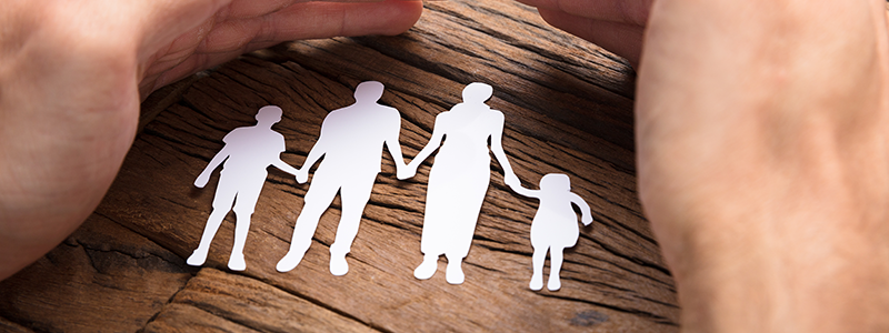 Paper cut out of family